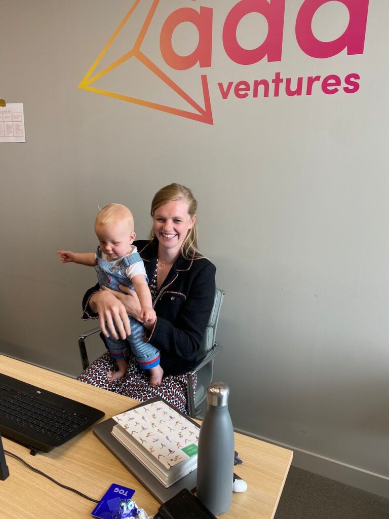 Check Warner with her child in the Ada Ventures office
